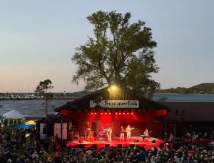 a group of people on a stage at a concert at Getaway by the bay in Owen Sound