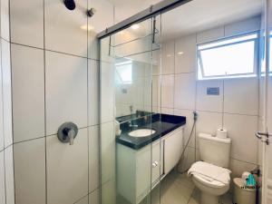 a bathroom with a sink and a toilet at Aquarius Style by Holiday Stays in Fortaleza +20 photos