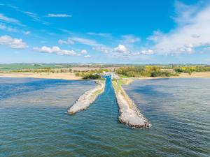 two rocks sticking out of the water at Marina Martinshafen in Sassnitz