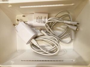 a refrigerator with a bunch of cables in it at Gwanganli Breeze Bay in Kwangan-dong