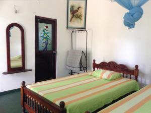 Postel nebo postele na pokoji v ubytování Lagoon Inn