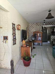 a living room with a tile floor at Casa para Carnaval in Olinda