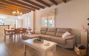 a living room with a couch and a table at Can Ferrer in Alcudia +39 photos