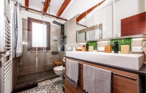 a bathroom with a sink and a toilet at Villa Son Gat Mallorca in Montuiri