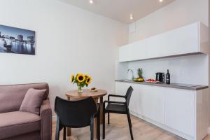 Kuchyňa alebo kuchynka v ubytovaní Platinum Residence Mokotów