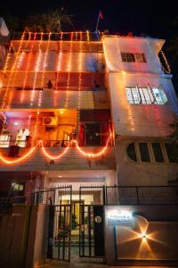 a building with christmas lights on top of it at Vinayaka Heritage in Patna
