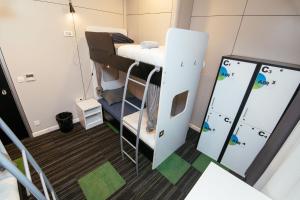 a dorm room with a bunk bed and a ladder at Hostel 365 For U in Dubrovnik +256 photos