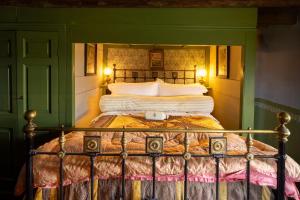 a bedroom with a bed in a green room at Orkney Retreats Island Farmhouses & Cottages in Sanday