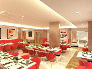 Restaurace v ubytování Red Fox by Lemon Tree Hotels, Tiruchirappalli Trichy