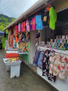 a store with clothes and other items on display at Minos Haven in Trafalgar +5 photos