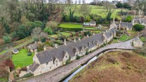 an aerial view of the ruins of an old castle at Arlington Mill in Bibury