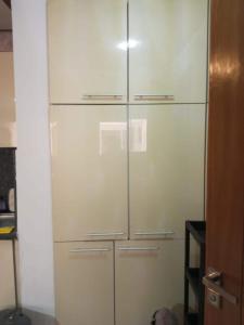 a tall closet with four drawers in a room at Waterfront apartment in Aghroud in Ti nʼ Mansour