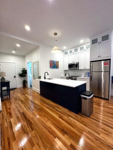 a kitchen with a large island in the middle at Downtown Providence FREE parking in Providence