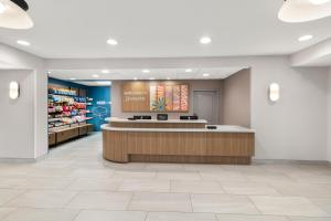 a lobby of a store with a cash register at Hampton Inn & Suites New Castle, PA in New Castle