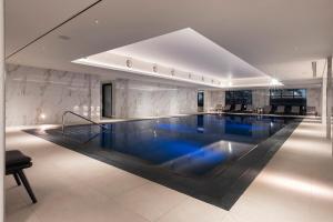 a large swimming pool in a building at Aldwark Manor Estate in Aldwark