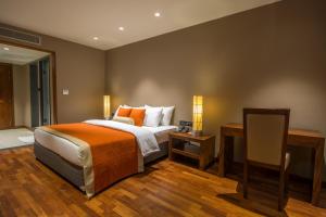 Cama o camas de una habitación en Swiss Residence Kandy
