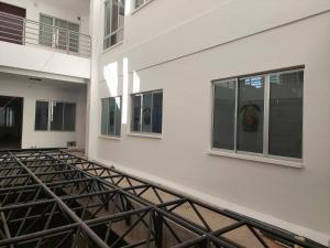 a building with windows and a walkway next to it at Libertad in Tarija