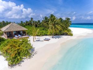 an aerial view of a resort on a beach at Hurawalhi Island Resort in Kuredu