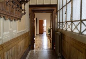 an empty hallway in a house with a hallway at Palazzo Marini in Spoleto +25 photos