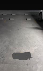 a shadow of a skateboard in a parking lot at El lujo y la comodidad in Zipaquirá