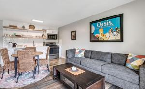 a living room with a couch and a table at Riverfront Studio in Downtown Bend in Bend +43 photos