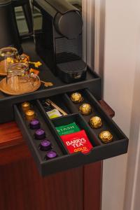 a black drawer filled with different types of food at Ha'penny View House in Dublin