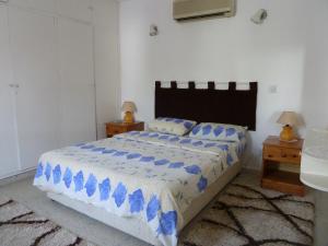 Ένα ή περισσότερα κρεβάτια σε δωμάτιο στο Hidden Cottage