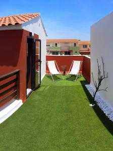 A garden outside Residential Majada Apartments