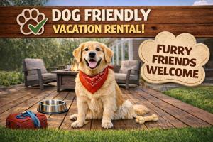 a dog is sitting on a wooden deck at River Road Lodge by NW Comfy Cabins in Leavenworth