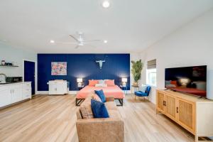 a bedroom with a bed and a blue wall at Ranchette Apartment- beach access small lake view in Buchanan Dam