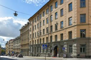 a large building on the corner of a street at Hotel Bema in Stockholm