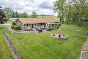 an aerial view of a house with a yard at On Deep Creek Time by Railey Vacations in Friendsville