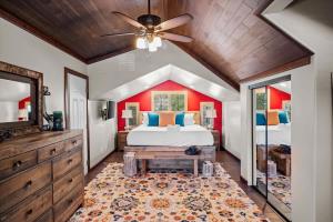a bedroom with a large bed and a ceiling fan at Timberland Hideaway in Payson