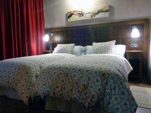 Postel nebo postele na pokoji v ubytování La Majada de la Covatilla