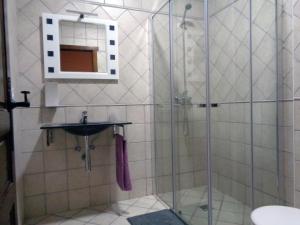 Koupelna v ubytování La Majada de la Covatilla + 15 fotografií