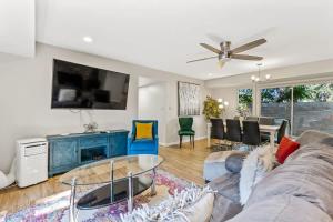 a living room with a couch and a table at High Pines Abode in Flagstaff
