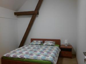 Postel nebo postele na pokoji v ubytování Agropenzion U Bartousku