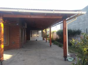a covered walkway leading into a building at Las Tres Reinas B in Colorado River