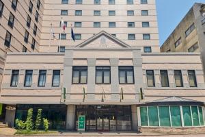 a building on a street in front of a building at Hotel Lexton Kagoshima in Kagoshima