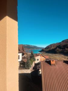 a view of the water from a building at Vila Davidoski in Mavrovo