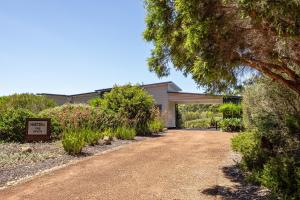 a house with a driveway in front of it at Hartzell One Seven - Private - Family Friendly in Wilyabrup