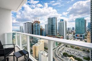 a balcony with a view of a city at Downtown Skyline Heights with Stunning Ocean View in Miami