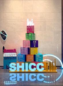 a pile of books stacked on top of each other at Oriental Riverside Bund View Hotel (Shanghai International Convention Center) in Shanghai