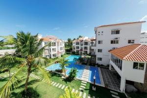 an aerial view of the courtyard of a apartment building with a swimming pool at Corte Sea A302, Luxury Penthouse in Punta Cana