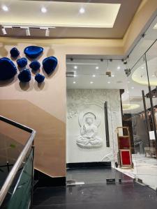 a room with blue bowls on the wall in a store at Hotel Imperial Plaza Asansol in Āsansol