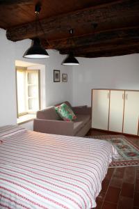 Postel nebo postele na pokoji v ubytování Antico Borgo Camporeso + 37 fotografií