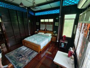 an overhead view of a bedroom with a bed at นำสมัย สุขใจ สนามชัย in Bangkok