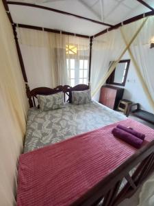 a bedroom with a bed in a tent at Sethun House in Mirissa