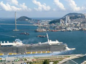 a cruise ship is docked in a harbor at Brown Suites Busan Station in Busan +27 photos