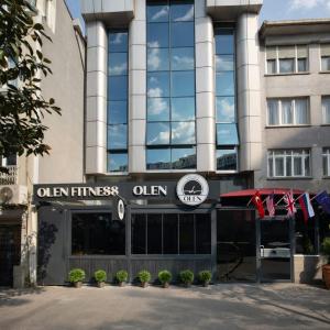 a building with a sign on the front of it at Olen Uskudar Hotel in Istanbul